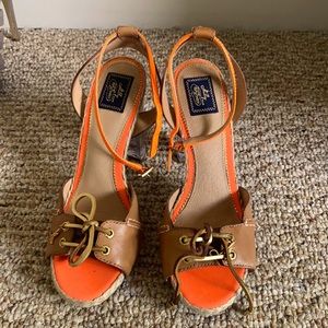 Tangerine/ tan open toe heels.